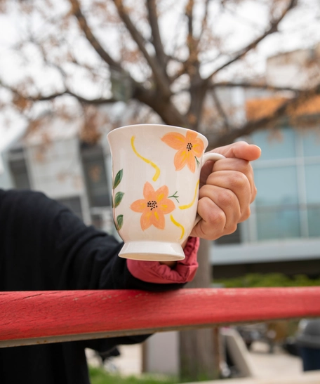 Handcrafted Clay Mug Painted with Colorful Floral Designs 