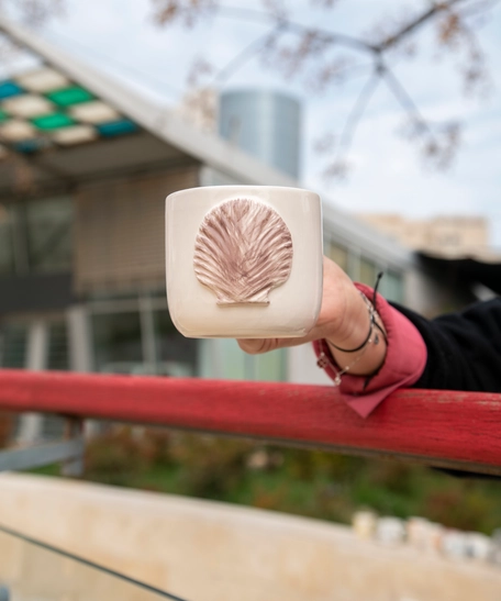 Handmade White Clay Mug with a 3D Sea Shell Design