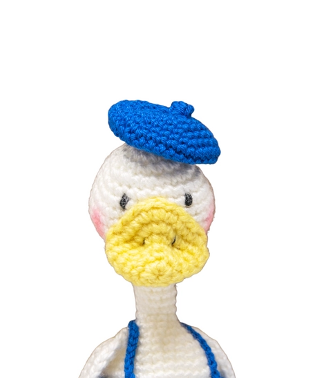 Hand-crocheted Cute Amigurumi Duck with Blue Hat