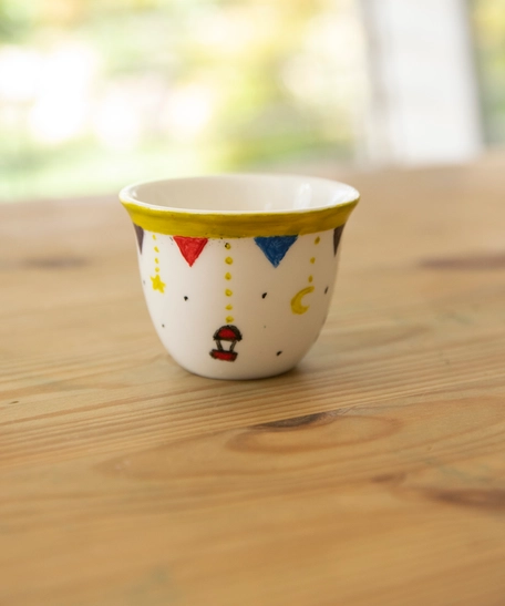 White Arabic Coffee Cup Adorned with Ramadan Inspired Drawings