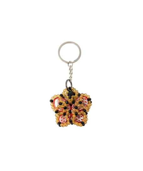 Key Chain In The Form of a Red Butterfly Surrounded by Yellow and Black Beads