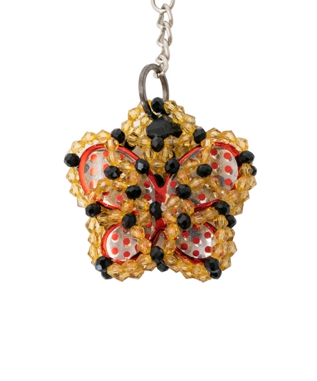 Key Chain In The Form of a Red Butterfly Surrounded by Yellow and Black Beads