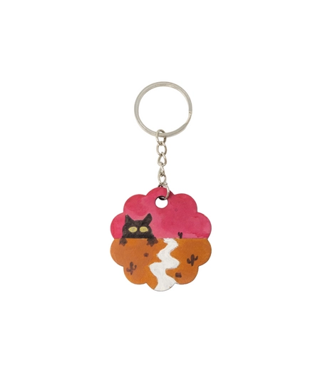 Cute Keychain in The Shape of a Flower Adorned with a Drawing of a Cat