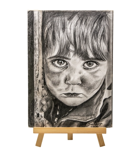 Pencil Drawing of a Child's Portrait with Artistic Precision and Realistic Details