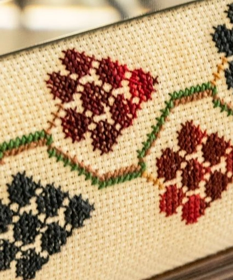 Square-shaped Wall Mirror with a Wooden Frame and Traditional Embroidery in Red