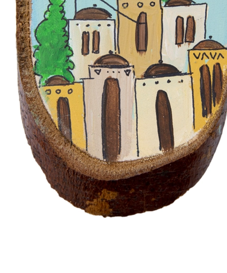 A handcrafted wooden decorative piece adorned with vibrant hand-painted illustrations depicting a city.