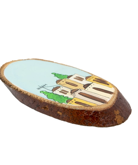 A handcrafted wooden decorative piece adorned with vibrant hand-painted illustrations depicting a city.