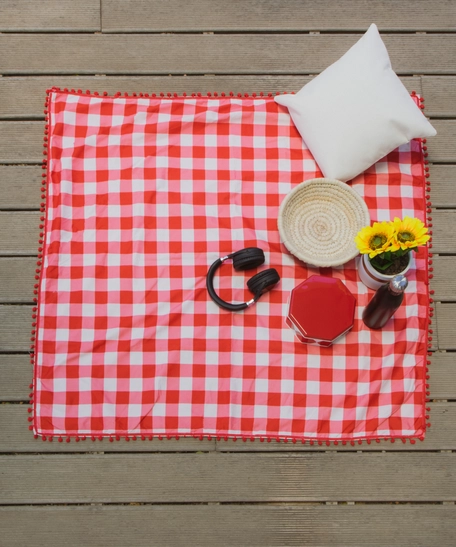 Checkered Red and White Picnic Blanket Decorated with Small Red Pompoms