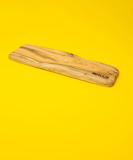 A Rectangular Wooden Food Board for Serving Various Appetizers