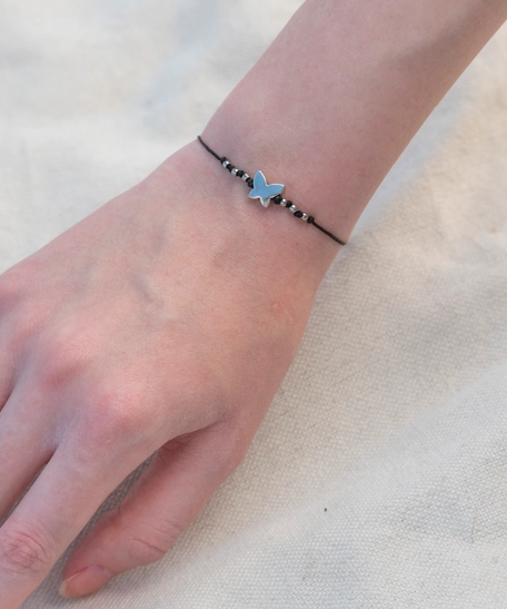 Butterfly Bracelet: Handmade from Black Woolen Thread and Adorned with Silver Beads