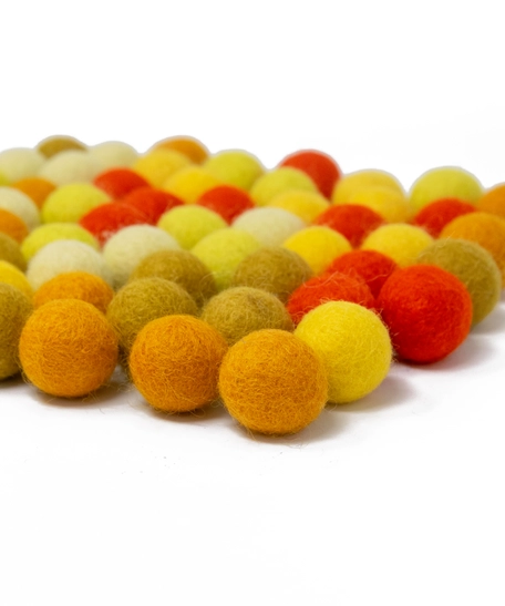 Colorful wool balls used with a wooden board game to teach children how to count! - Wool Balls Blue