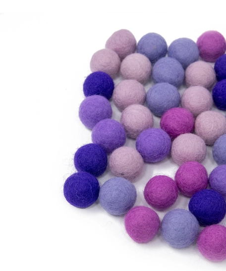 Colorful wool balls used with a wooden board game to teach children how to count! - Wool Balls Blue