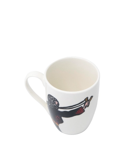 White ceramic mug with the drawing of a Palestinian woman fighting for her land