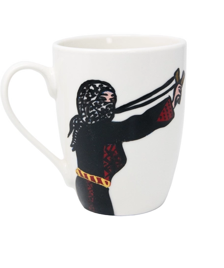 White ceramic mug with the drawing of a Palestinian woman fighting for her land