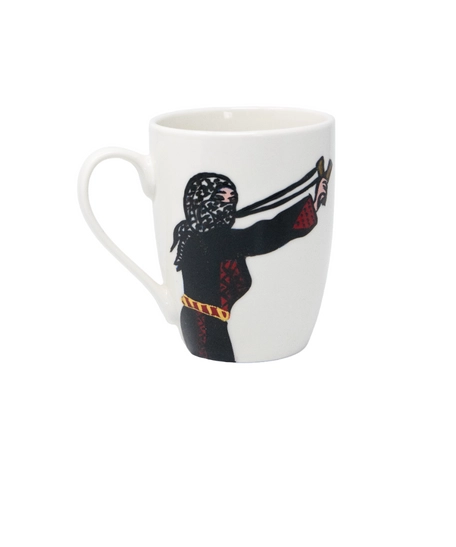 White ceramic mug with the drawing of a Palestinian woman fighting for her land