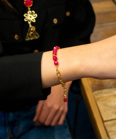 Modern Gold Accessory Set Decorated with Fuchsia Beads - Dangling Earrings, Necklace and Bracelet with a Flower Design