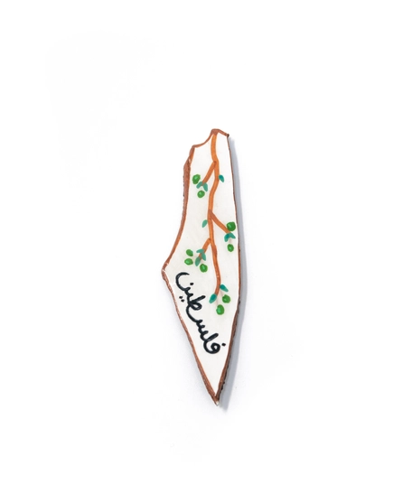 A handmade refrigerator magnet shaped like the map of Palestine, featuring a design of olive tree branches! - Palestine