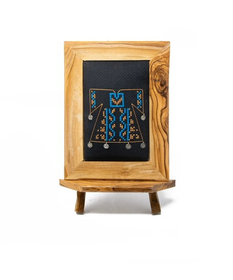 A wooden frame embroidered from the inside in the shape of a dress - purple color