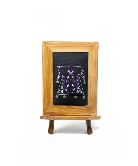 A wooden frame embroidered from the inside in the shape of a dress - purple color