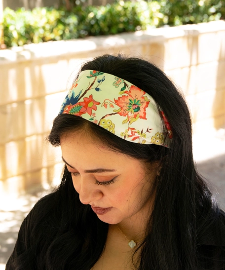 White headband with colorful floral patterns