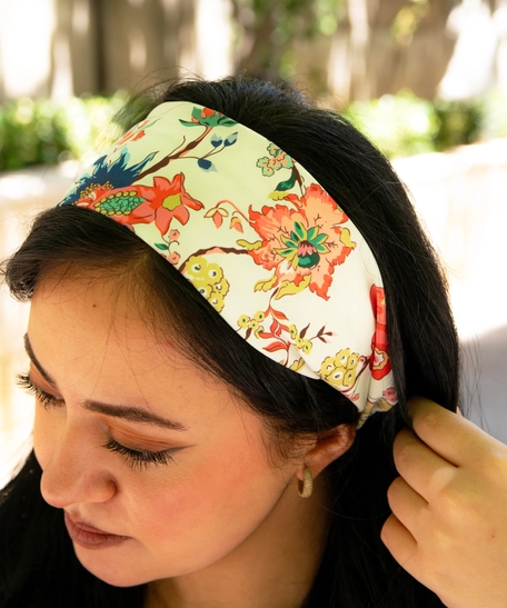 White headband with colorful floral patterns