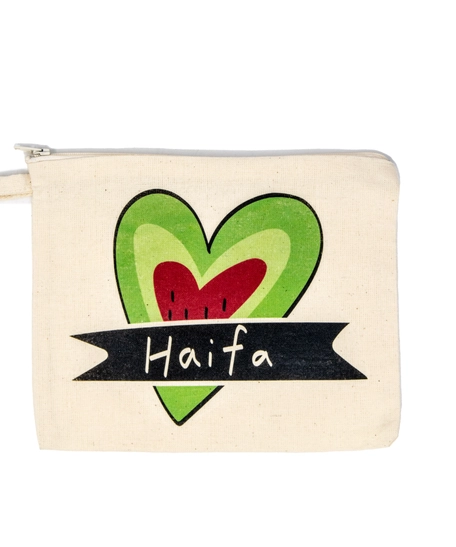 Hand-painted makeup bag featuring the word Haifa, celebrating the beauty and heritage of Palestine.