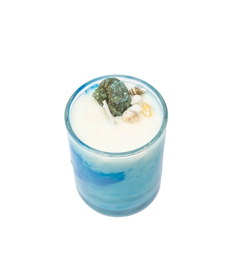Candle in a Glass Decorated with Seashells, Evoking Calm Coastal Vibes