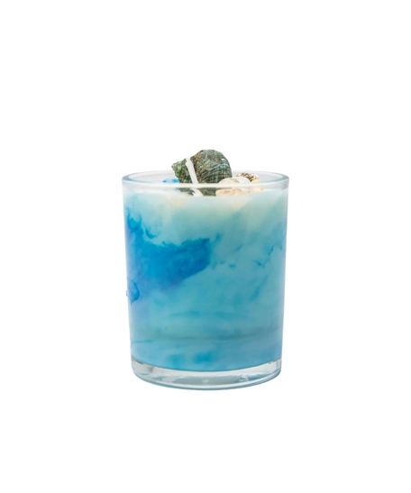 Candle in a Glass Decorated with Seashells, Evoking Calm Coastal Vibes