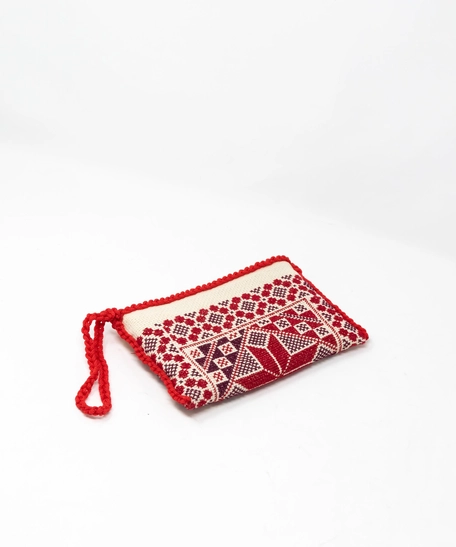 حقيبة يد صغيرة مطرزة باللون الأبيض والأحمر